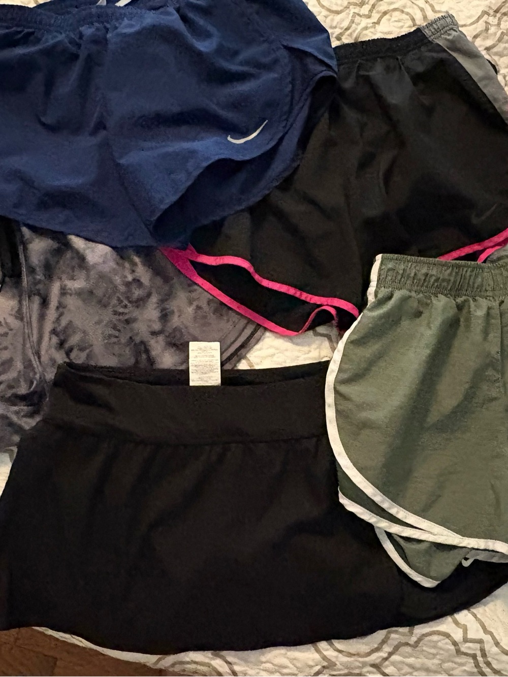 Nike Bundle 3 shorts/1 skirt with 1 pair under armour.